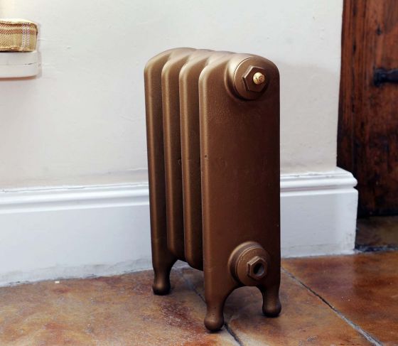 Thackray 440mm high cast iron radiator in Guinea Gold